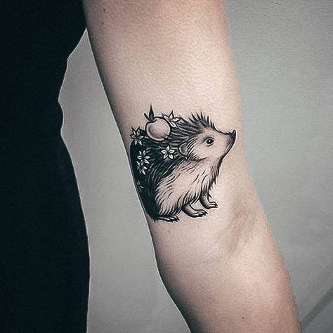 Decorative Porcupine Tattoo On Female