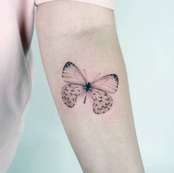 Decorative Realism Tattoo On Female