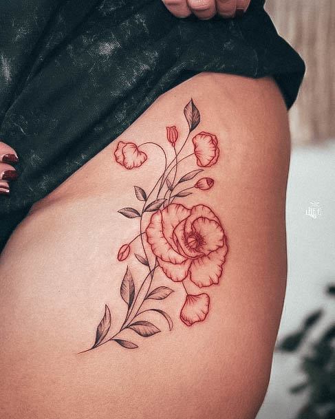 Decorative Red Ink Tattoo On Female