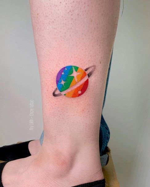 Decorative Saturn Tattoo On Female