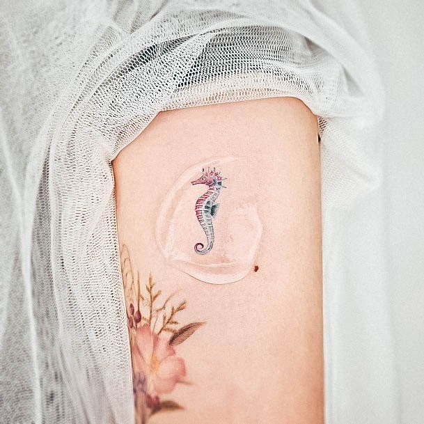 Decorative Seahorse Tattoo On Female