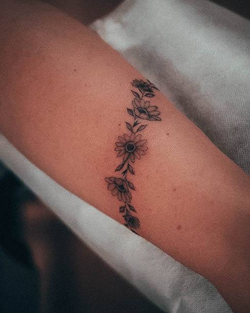 Decorative Simple Flower Tattoo On Female