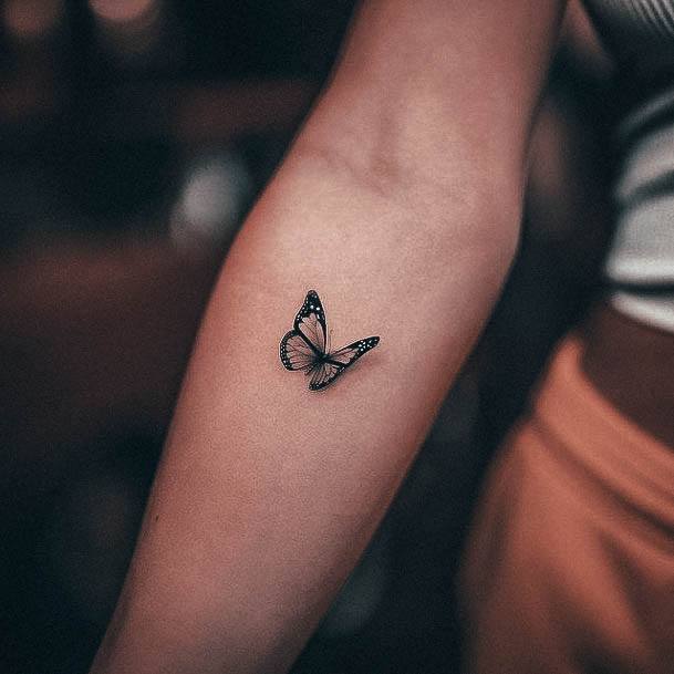 Decorative Small Butterfly Tattoo On Female