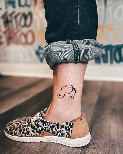 Decorative Small Elephant Tattoo On Female