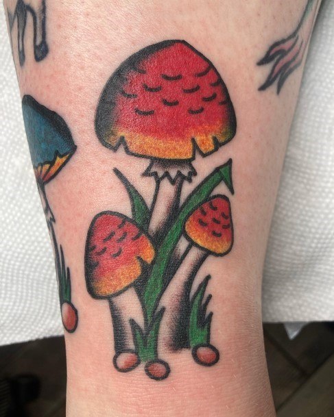 Decorative Small Mushroom Tattoo On Female