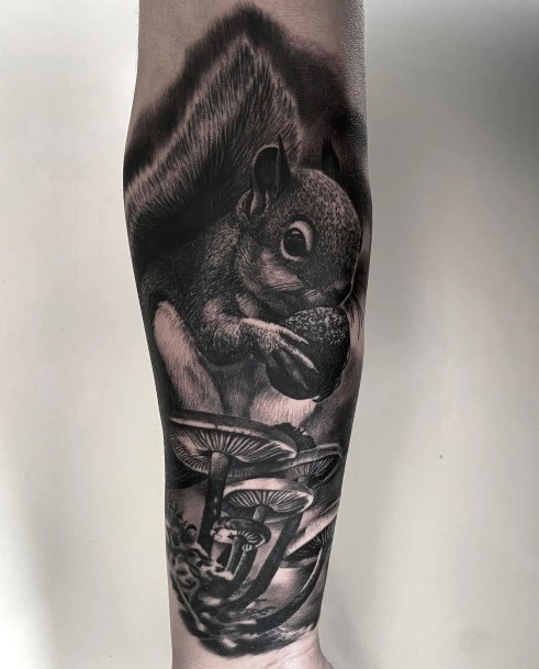 Decorative Squirrel Tattoo On Female