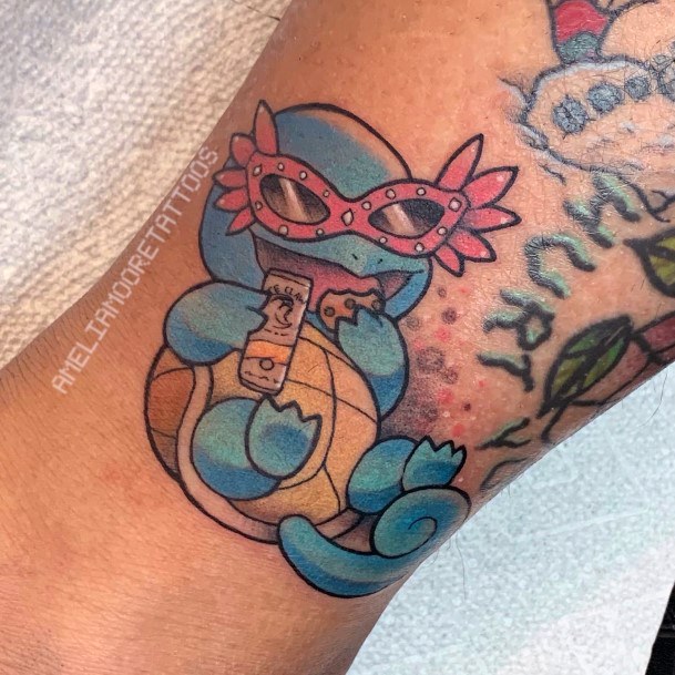 Decorative Squirtle Tattoo On Female