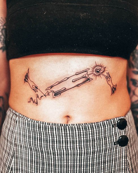 Decorative Stomach Tattoo On Female