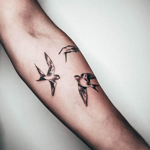 Decorative Swallow Tattoo On Female