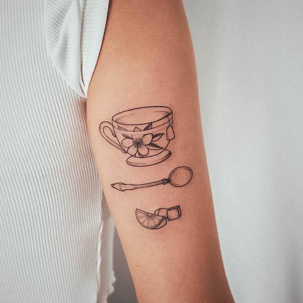 Decorative Tea Cup Tattoo On Female