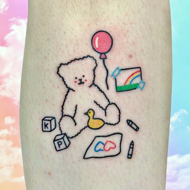 Decorative Teddy Bear Tattoo On Female