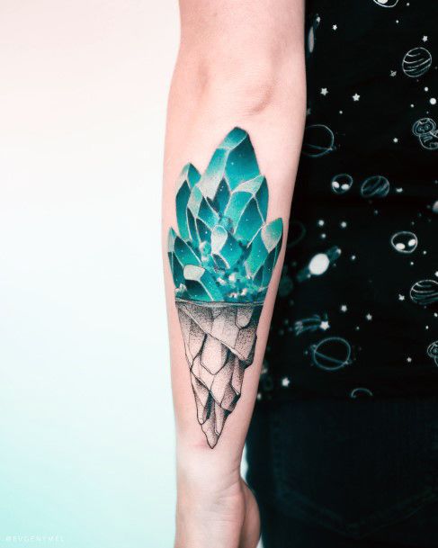 Decorative Turquoise Tattoo On Female