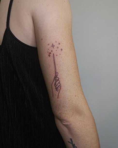 Decorative Wand Tattoo On Female