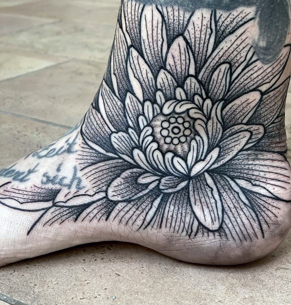 Decorative Water Lily Tattoo On Female