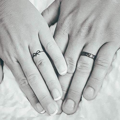 Decorative Wedding Ring Tattoo On Female