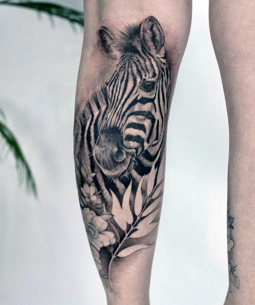 Decorative Zebra Tattoo On Female