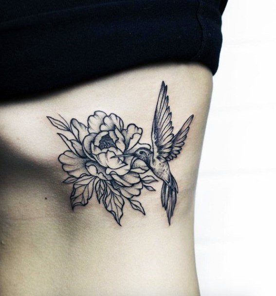 Deep Black Flower And Hummingbird Tattoo Torso