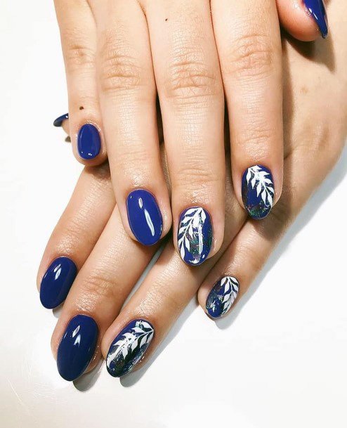 Deep Blue Nails With Leaf Motif For Women