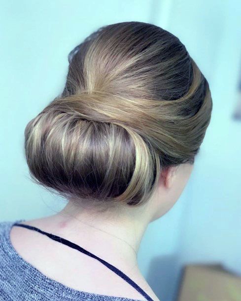 Deftly Tucked In Golden Chignon Hairstyle For Women