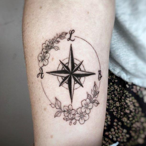 Delicate Flower And Compass Tattoo Womens Forearms