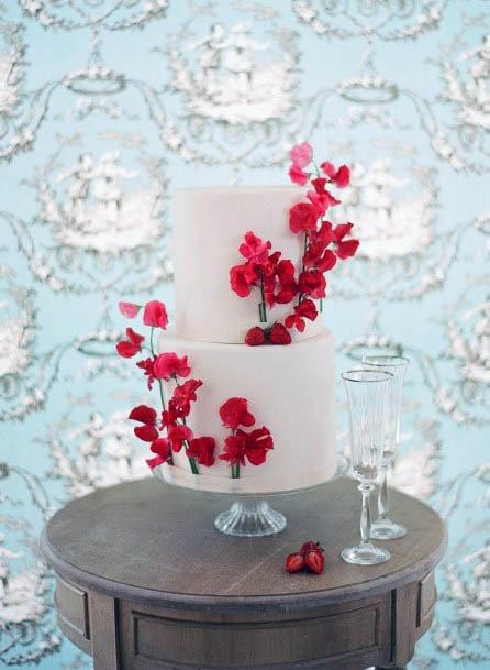 Delightful Red Flowers On White Cake