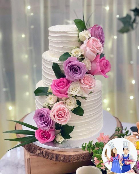 Delightful Roses On 3 Tier Wedding Cake Women