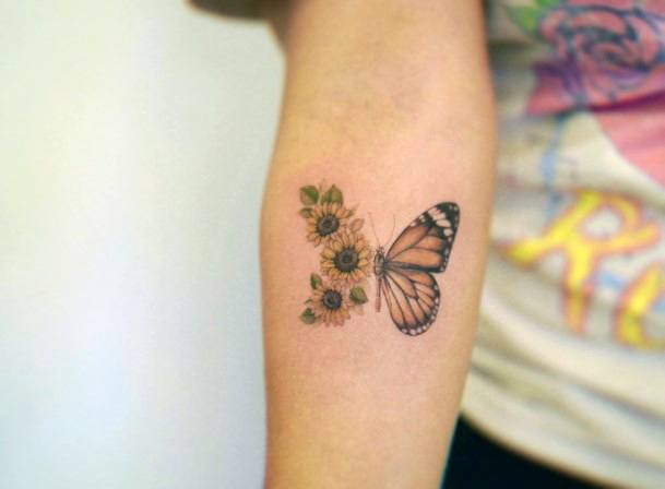 Delightful Tattoo For Women Butterfly Flower Designs