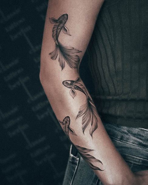 Delightful Tattoo For Women Fish Designs