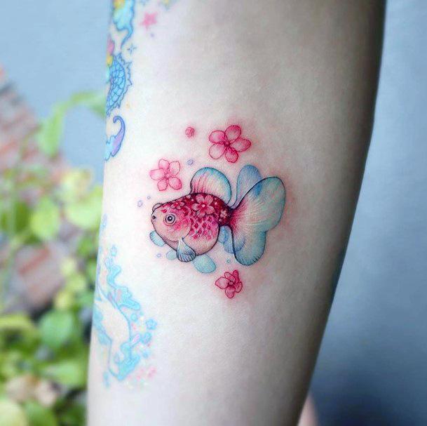 Delightful Tattoo For Women Goldfish Designs