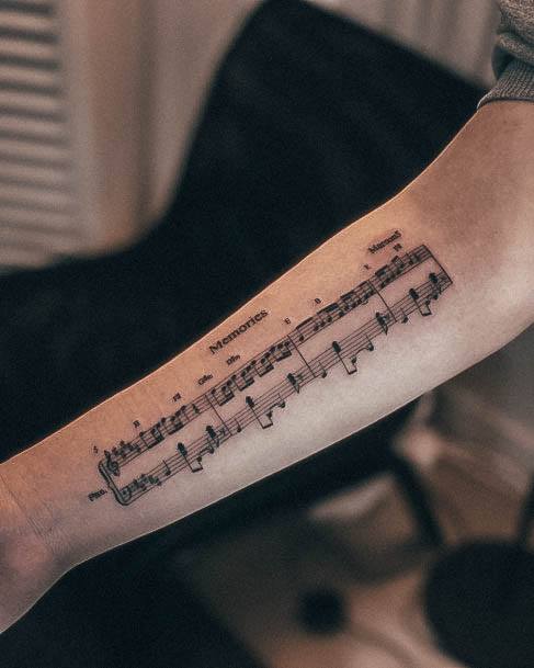 Delightful Tattoo For Women Music Note Designs