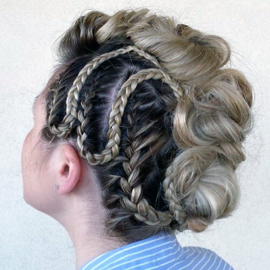 Disheveled Mohawk With Long Hair Braided Into A Playful Hairstyle