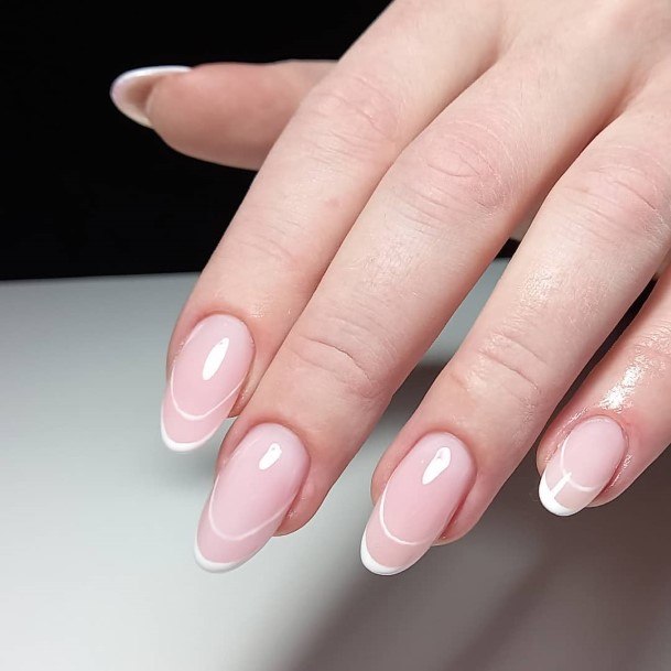 Distinctive Female Almond French Nail Designs