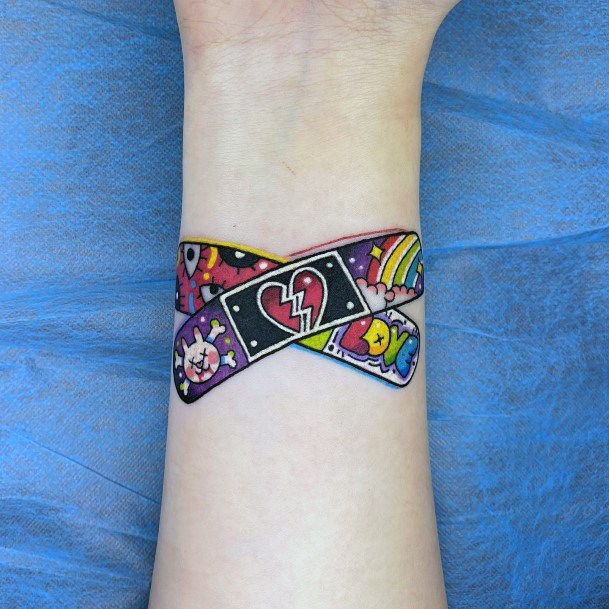 Distinctive Female Bandaid Tattoo Designs