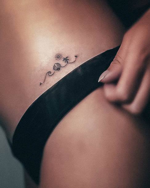 Distinctive Female Beach Tattoo Designs