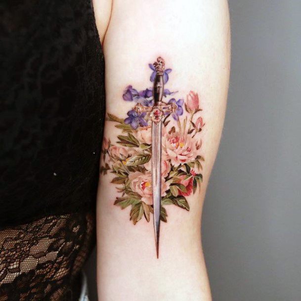 Distinctive Female Bicep Tattoo Designs