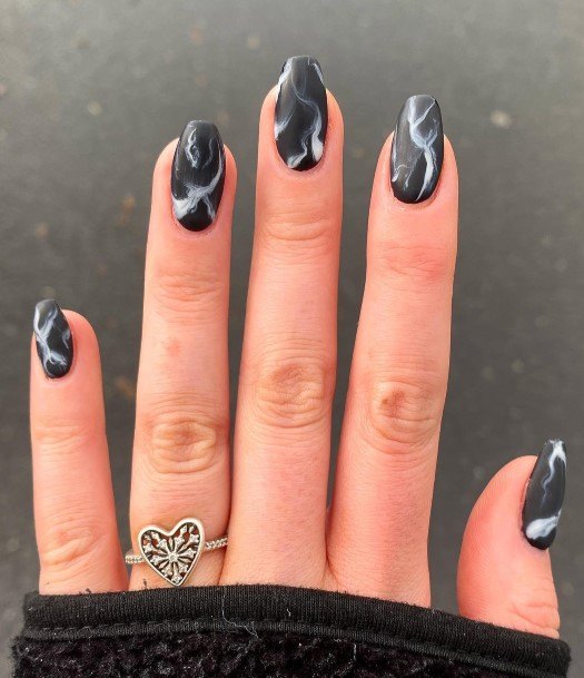 Distinctive Female Black And White Marble Nail Designs