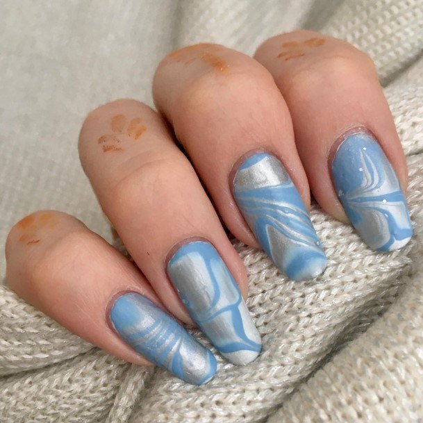 Distinctive Female Blue And Silver Nail Designs