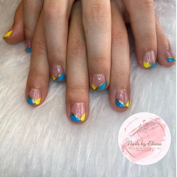 Distinctive Female Blue And Yellow Nail Designs