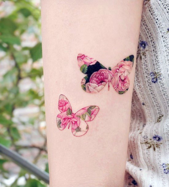 Distinctive Female Butterfly Flower Tattoo Designs