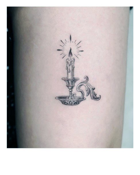 Distinctive Female Candle Tattoo Designs