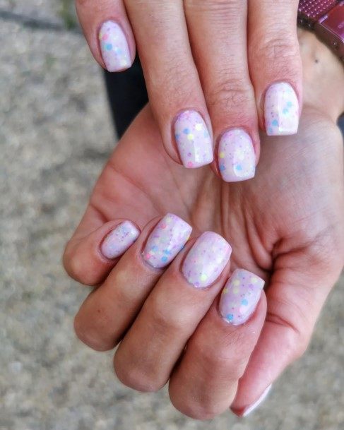 Distinctive Female Confetti Nail Designs