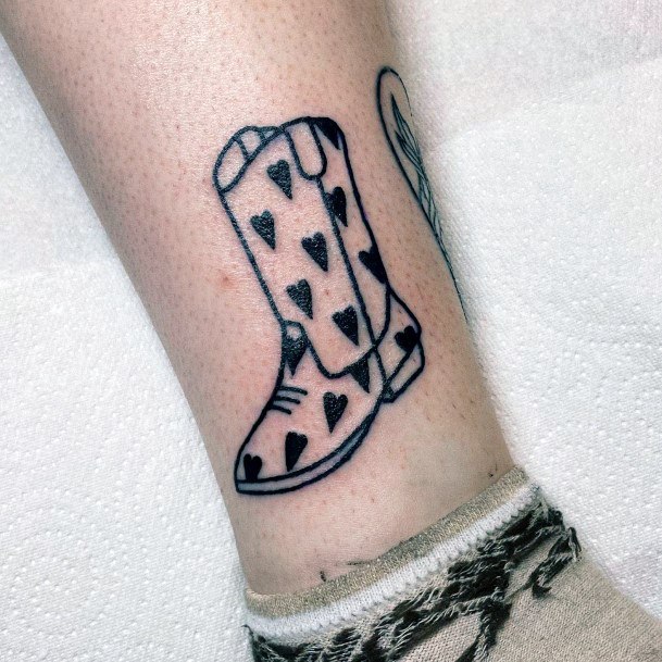 Distinctive Female Cowboy Boot Tattoo Designs