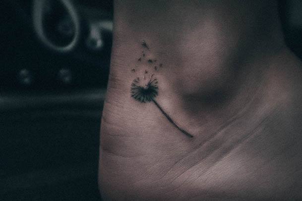 Distinctive Female Dandelion Tattoo Designs