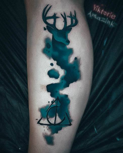 Distinctive Female Deathly Hallows Tattoo Designs