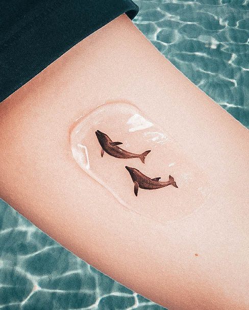 Distinctive Female Dolphin Tattoo Designs