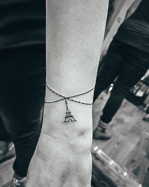 Distinctive Female Eiffel Tower Tattoo Designs