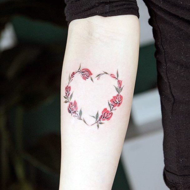 Distinctive Female Flower Heart Tattoo Designs