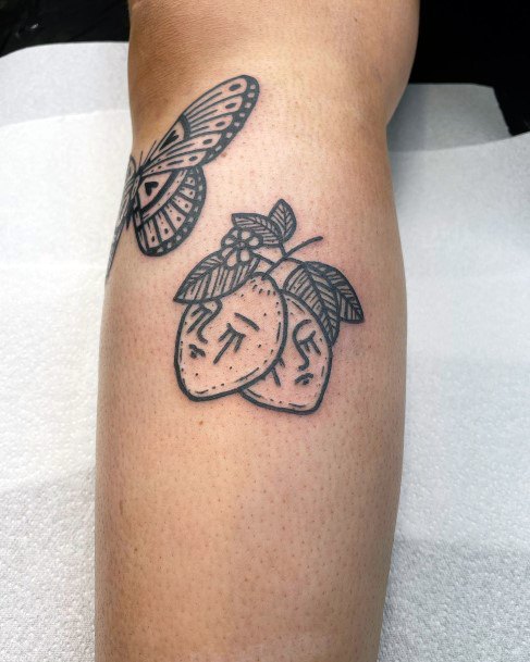 Distinctive Female Fruit Tattoo Designs