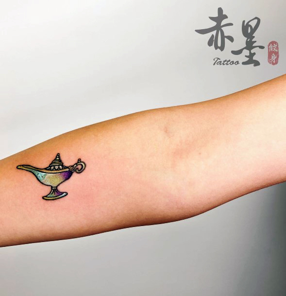 Distinctive Female Genie Tattoo Designs