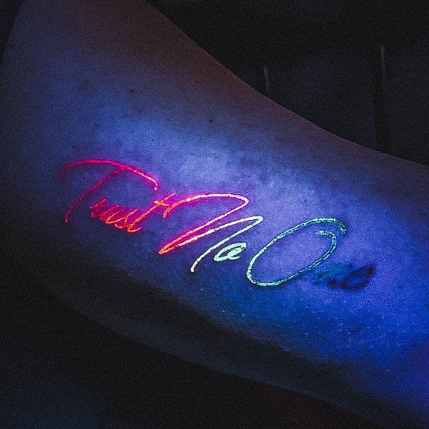 Distinctive Female Glow In The Dark Tattoo Designs Script Trust No One